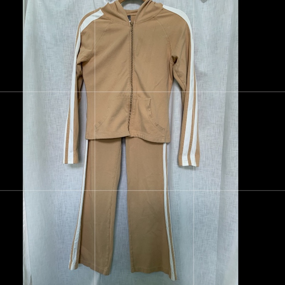 Tan and white track suit